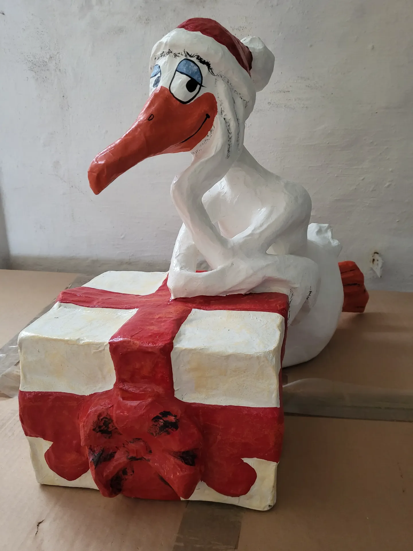[0080698] oie de Noël couchée, pap.mache