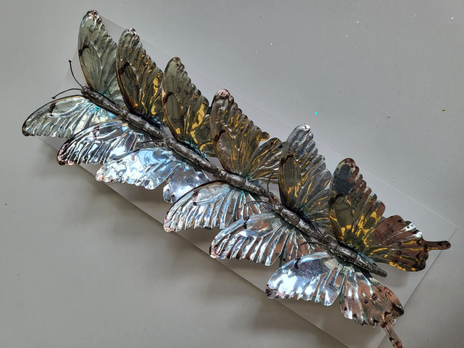 [0043526] papillons/pince argent (1)